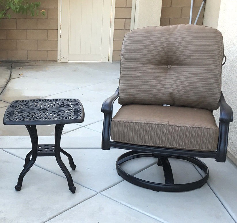 Patio set of 2 cast aluminum 1 swivel club chair and Elisabeth end table.