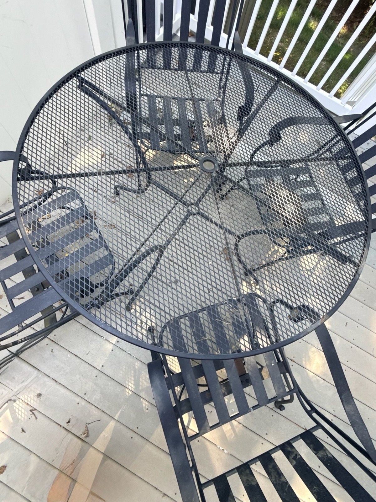 Vintage Wrought Iron Patio Set with Round Mesh Table and 4 Rocker Chairs