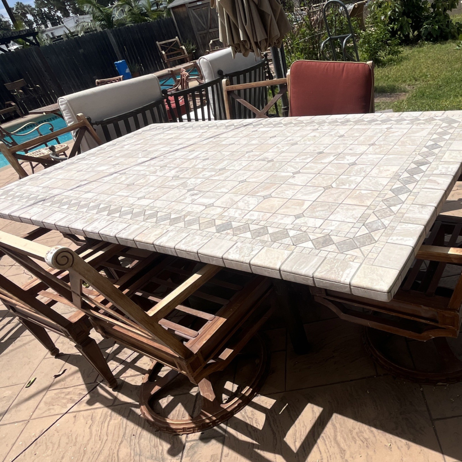 Stone/Concrete Rectangle Patio Table Set with Beige Top, 8 Brown Wooden Chairs
