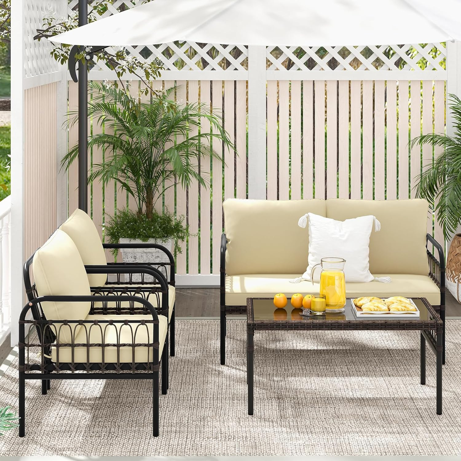 Beige 4-Piece Wicker Patio Set with Cushions & Glass Table for Outdoor Comfort