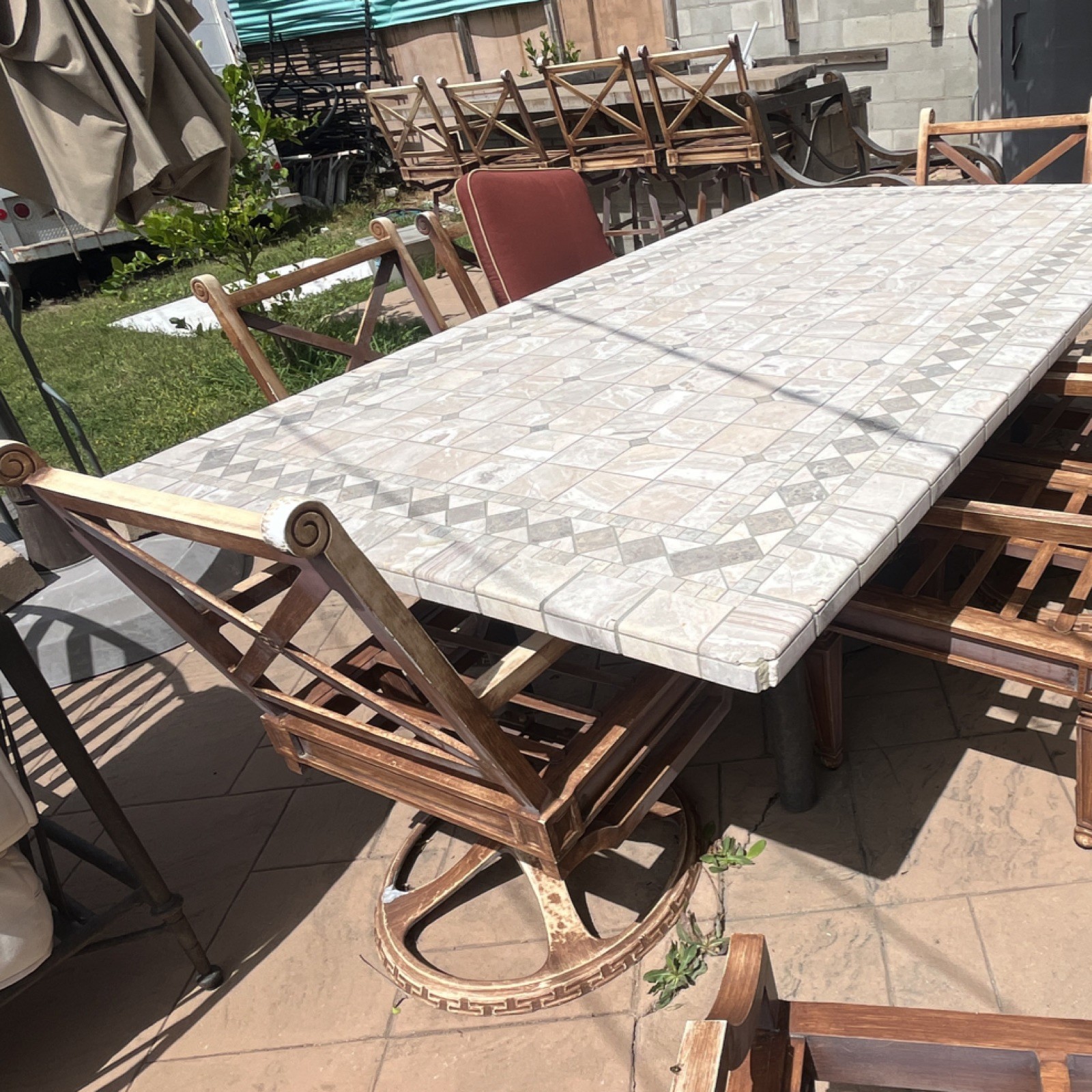 Stone/Concrete Rectangle Patio Table Set with Beige Top, 8 Brown Wooden Chairs