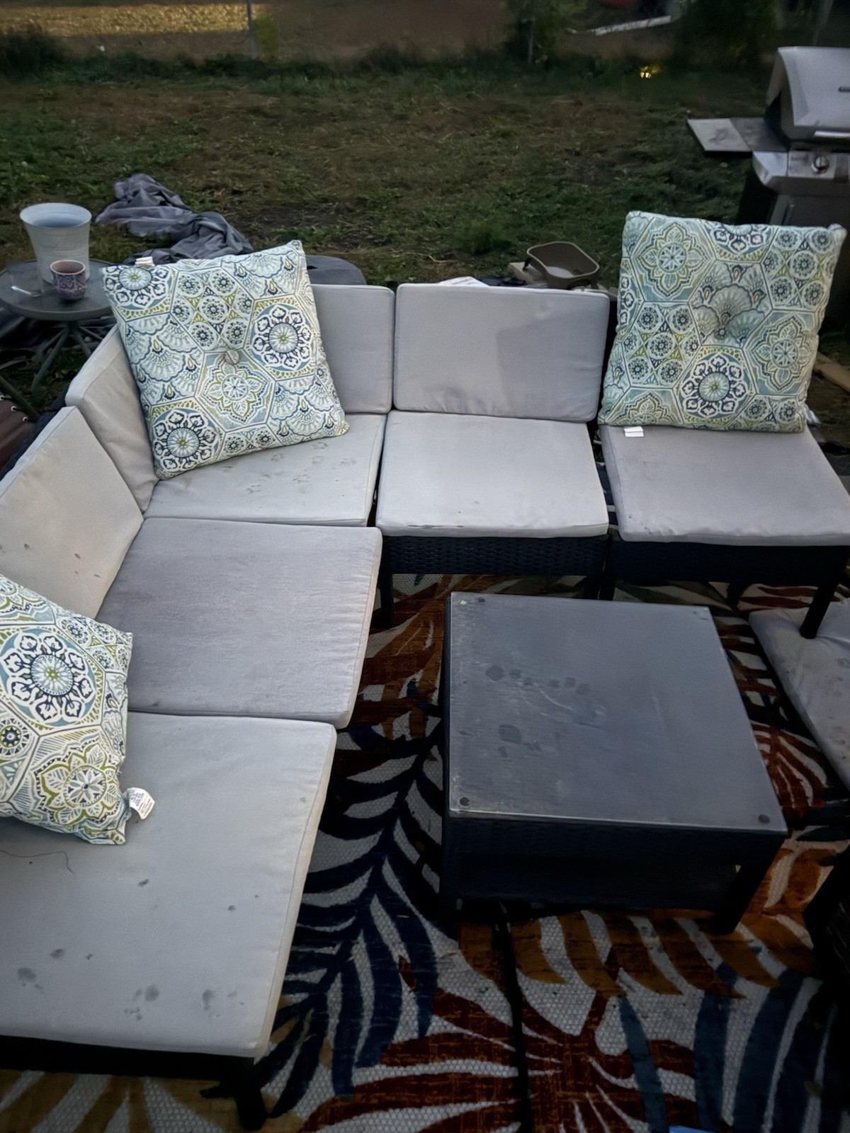 Outdoor Rattan Sectional Set with Beige Cushions & Black Square Glass Table