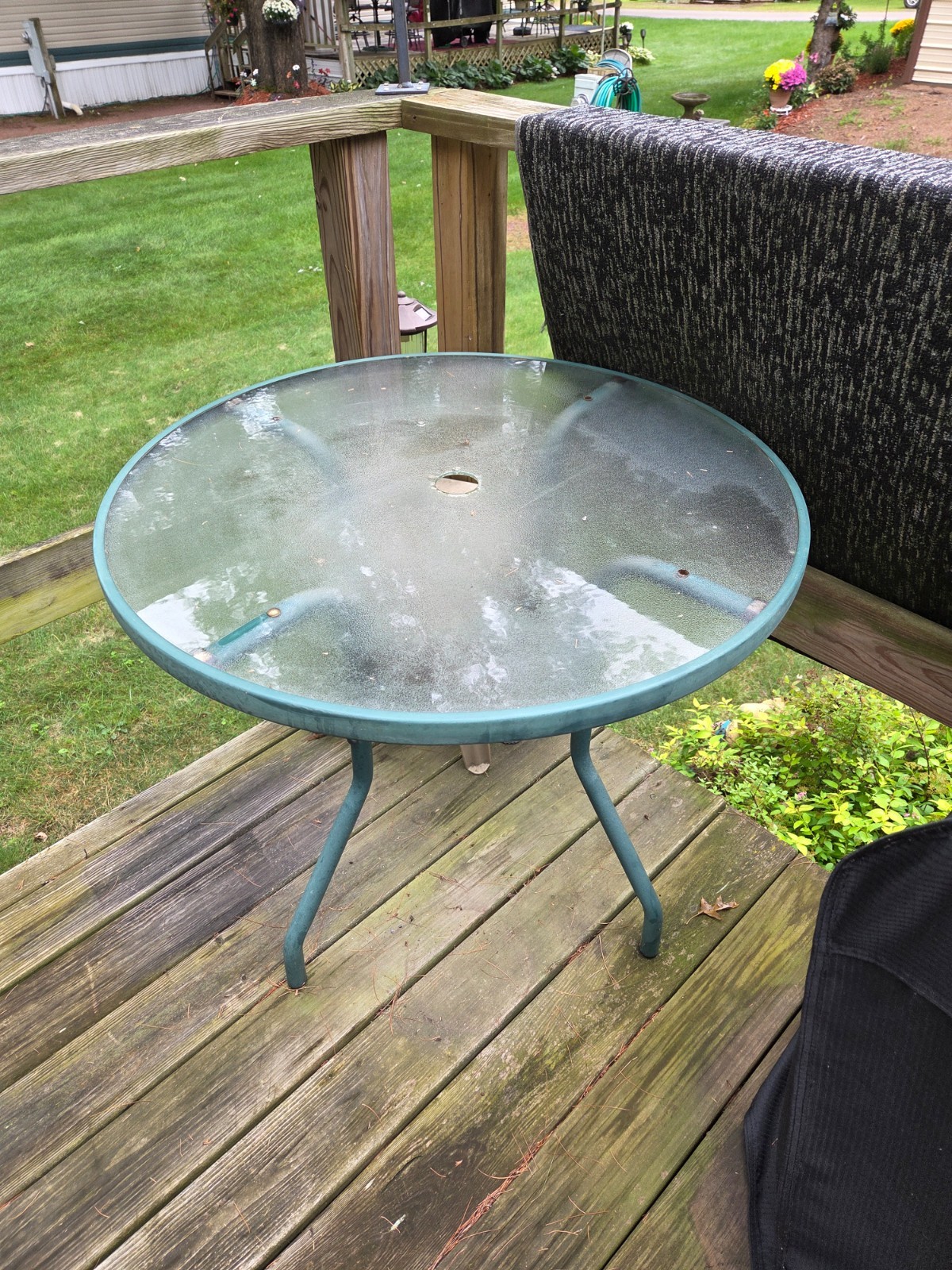 patio table and 4 chairs set. slightly used. no umbrella or stand