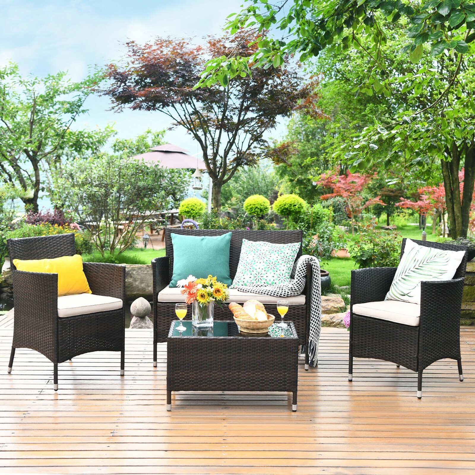 Costway 4PCS Rattan Patio Furniture Set Sofa Chair Coffee Table – See